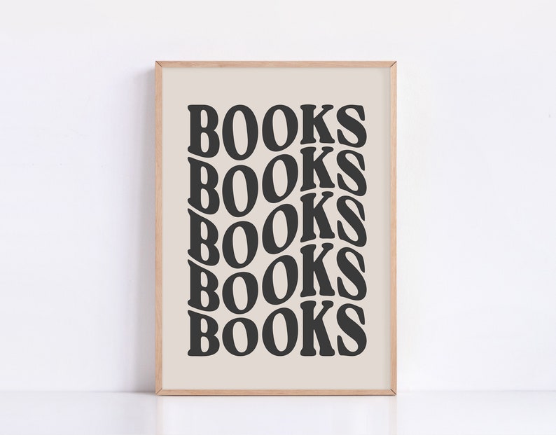 May include: A framed print with the word "BOOKS" repeated five times in a black, bold font on a beige background.