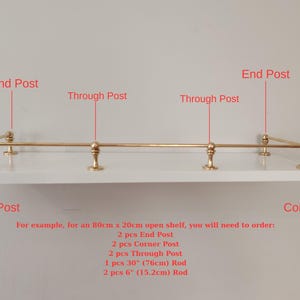 May include: A white shelf with brass-colored hardware, including end posts, through posts, and corner posts. The image includes text indicating the components needed for an 80cm x 20cm open shelf, with rod measurements in inches.