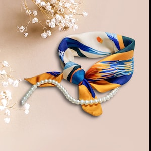 Silk scarf &quot;Bird of Paradise&quot; – hand-rolled, double-sided print, 53 x 53 cm, orange, gift wrapping | Design from Ukraine