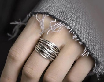 Viking strand wire ring as an adjustable wide ring in silver plated
