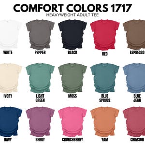 Peut inclure: Pr&eacute;sentation de t-shirts adultes Comfort Colors 1717 de poids lourd, dans diverses couleurs, dont blanc, noir et rouge. L'image pr&eacute;sente une gamme de teintes, chaque chemise &eacute;tant &eacute;tiquet&eacute;e avec son nom de couleur. Le texte &laquo;&nbsp;COMFORT COLORS 1717&nbsp;&raquo; est en haut.