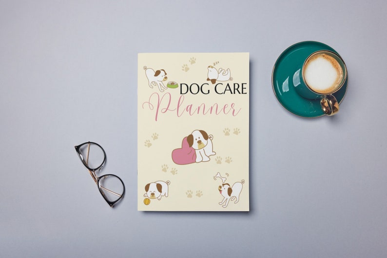 May include: A cream-colored planner with the text "DOG CARE Planner" in pink and brown lettering. The cover features illustrations of dogs in various poses, including a dog sleeping, a dog eating from a bowl, a dog playing with a bone, and a dog with a pink heart.