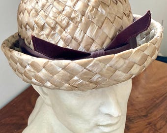 K&L Hat, Ligne Parisienne: Braided beige raffia hat with brown ribbon and bow, France, fifties