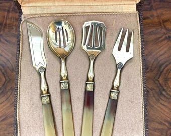 4-piece French Hors d'Oeuvre cutlery set, brass and bakelite, in original box