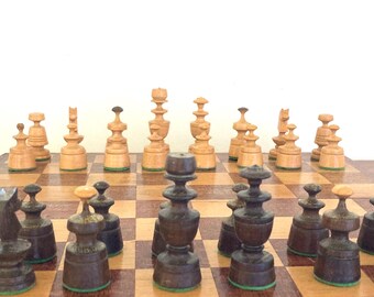 Small wooden chess set in box with board