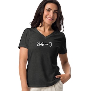 34-0 guilty verdict t shirt, disgraced president, anti-Trump, impeach Trump, convicted felon, democracy, Women’s relaxed v-neck t-shirt