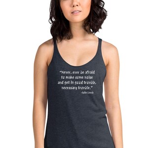 May include: A dark blue tank top with a white quote by John Lewis: "Never, ever be afraid to make some noise and get in good trouble, necessary trouble."