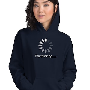 May include: A navy blue hoodie with a white loading icon and the text "I'm thinking..." printed on the front.