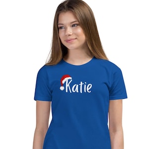 Santa Hat with custom name kids t shirt, Christmas magic, Santa Claus, customizable, personalized, customized, Youth Short Sleeve T-Shirt
