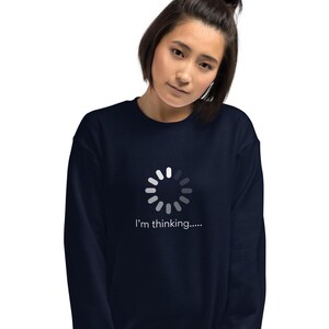 May include: A navy blue sweatshirt with a white loading icon and the text "I'm thinking..." printed on the front.
