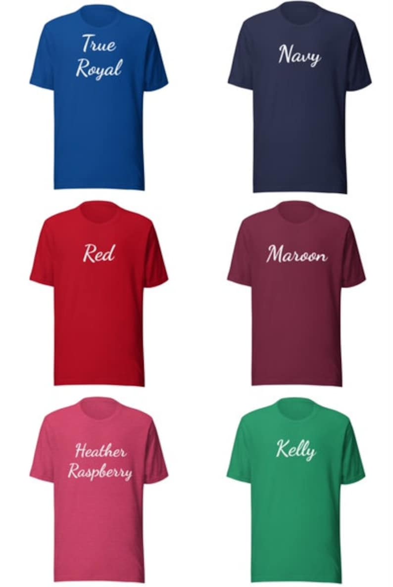 May include: Six t-shirts in different colors with white text. The colors are True Royal, Navy, Red, Maroon, Heather Raspberry, and Kelly.