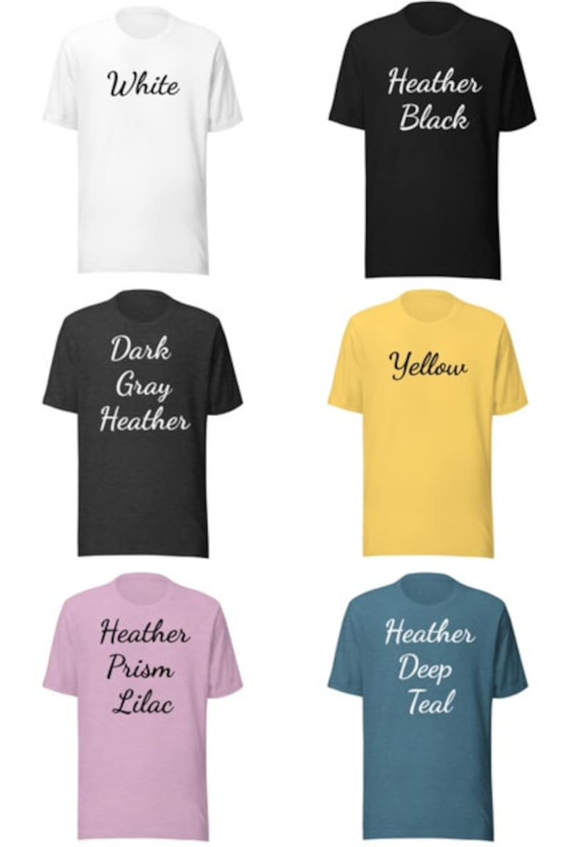May include: Six different color t-shirts with various text printed on them. The colors are white, heather black, dark gray heather, yellow, heather prism lilac, and heather deep teal.