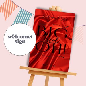 May include: A red sign on a wooden easel with the text "BIG five OH!" and "Welcome to Liz's". A white circle with the words "welcome sign" is on the left. The sign is for a birthday celebration.