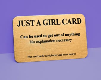 Just a Girl Card：ユーモラスなアルミ製「どんな状況からも逃れられる」カード
