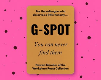 May include: A mustard-colored card with the text "G-SPOT" in large black letters. The card also includes the phrases "For the colleague who deserves a little honesty...", "You can never find them", and "Newest Member of the Workplace Roast Collection."
