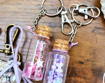 Llavero con forma de botella de cristal y confeti para teléfono móvil, color rosa y morado