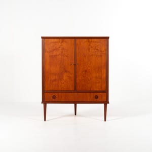 Mueble esquinero danés de teca de mediados de siglo con cajón, década de 1960.