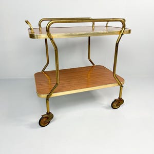 Vintage barwagen met formica planken en metalen accenten
