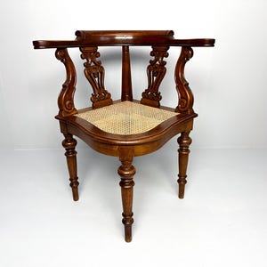 Antique Teak Corner Chair with Carved Backrest and Webbing Seat, 19th Century