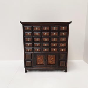 Coromandel Collector’s Cabinet with 25 Drawers and 2 Doors – Walnut Look, 20th Century