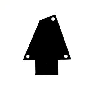 May include: Black guitar pickguard with three holes.
