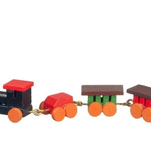 May include: A wooden toy train set with a black engine, red caboose, and two green and brown boxcars. The train has orange wheels and is connected by a gold chain.