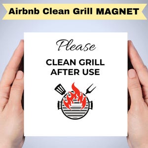 May include: White magnet with black text that reads "Please Clean Grill After Use". A black and red grill with flames is below the text.