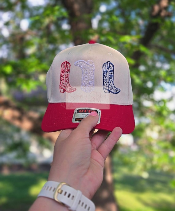 Red and White Trucker Hat with Boot Design Red, White, and Boots Trucker Hat – Texas Sun Creative main image 3