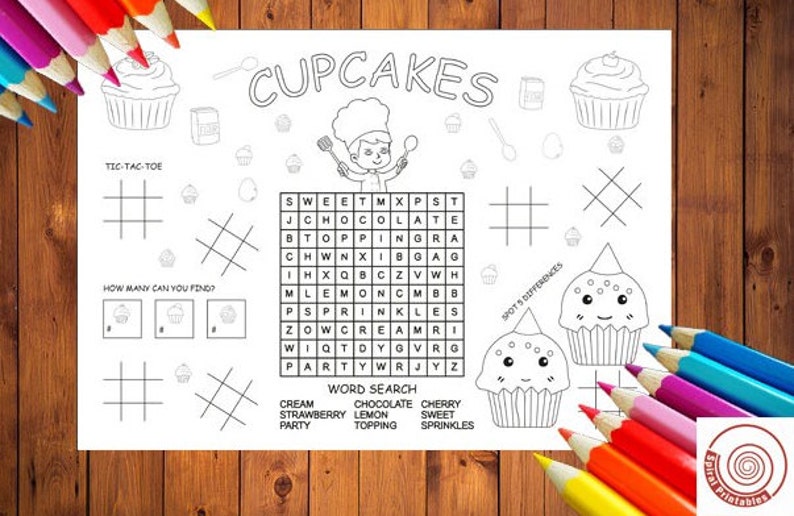 May include: A black and white printable activity sheet with a cupcake theme. The sheet includes a word search, tic-tac-toe, a 'how many can you find' game, and a spot the difference game. The sheet also features a chef character and cupcakes.