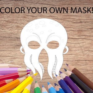 Peut inclure: Une page &agrave; colorier imprimable repr&eacute;sentant un masque d'octopus. Le masque est dessin&eacute; en noir et blanc sur un fond en bois. Un ensemble de crayons de couleur sont dispos&eacute;s autour du masque.