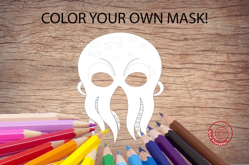 Peut inclure: Une page &agrave; colorier imprimable repr&eacute;sentant un masque d'octopus. Le masque est dessin&eacute; en noir et blanc sur un fond en bois. Un ensemble de crayons de couleur sont dispos&eacute;s autour du masque.