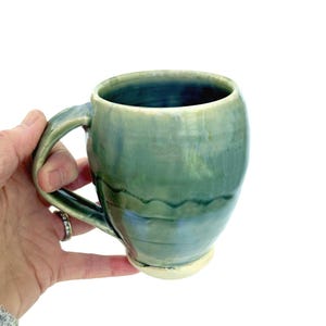 Handmade Sage Green Ceramic Coffee Mug: Wheel Thrown Stoneware, Blue Accents (15 oz)