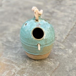 Turquoise Blue Ceramic Birdhouse is made of stoneware clay