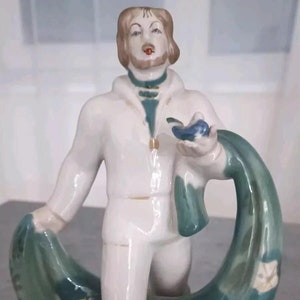 CinderellaPorcelain Figurine of the USSR FISHERMAN WITH a net.
