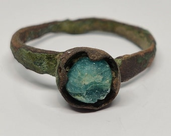 Beautiful original medieval ring with a stone on the finger.