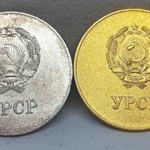 Silver-plated and gold-plated medal to a graduate of the University of the Ukrainian Socialist Republic of Ukraine.