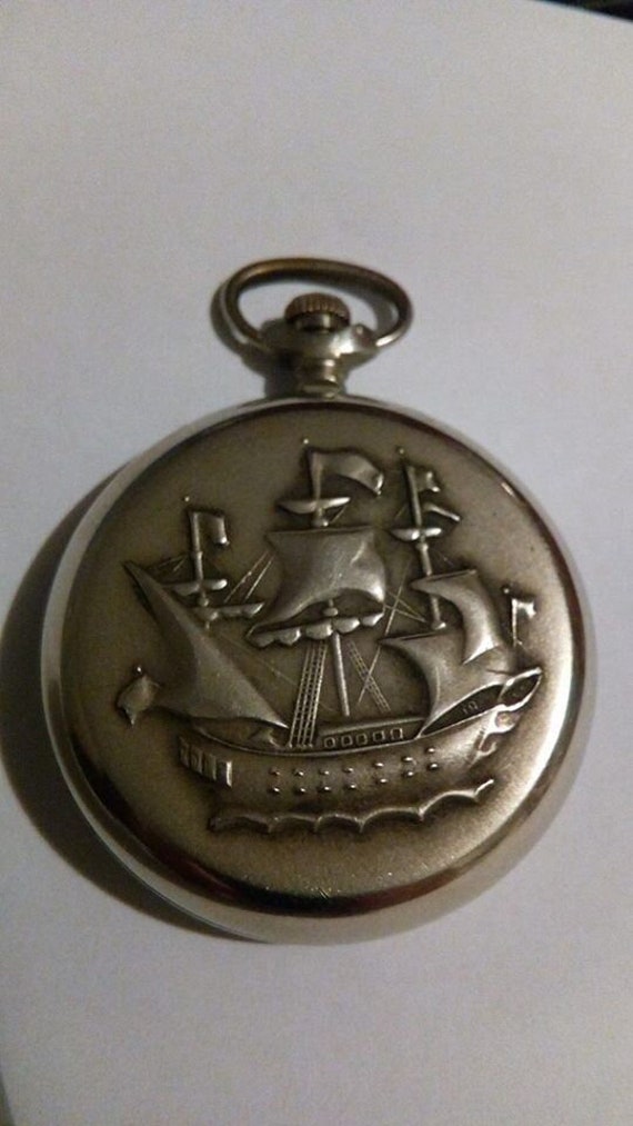 Pocket watch Molnija with the image of the ship.