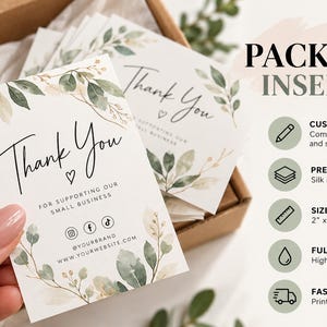 May include: Rectangular white thank you cards featuring green and gold watercolor leaf illustrations. The text reads Thank You For Supporting Our Small Business, with social media icons and placeholders for a brand name and website, measuring 2 by 3.5 inches.