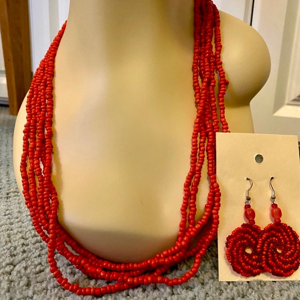 Burnt orange beaded necklace with matching earrings! Never been worn!
