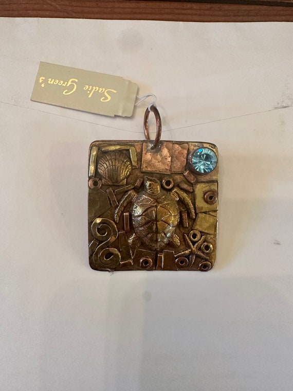 Stunning brass and jewel turtle pendant! Brand new