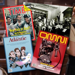 May include: Three magazine covers featuring the Ghostbusters. The Time magazine cover features the Ghostbusters in front of a New York City skyline. The Atlantic magazine cover features a cartoon illustration of the Ghostbusters. The Omni magazine cover features a black and white photo of the Ghostbusters' equipment.