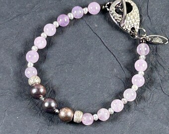 Beautiful pink amethyst bracelet, sterling silver "Ohm" beads, freshwater pearls, large peacock pearls, hammered silver-tone toggle clasp