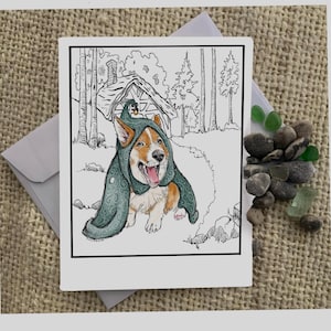May include: A greeting card featuring a Corgi dog wearing a green hooded cloak, set in a forest scene. The illustration is in black and white with the dog's fur in shades of brown and white. The card is on a white background.