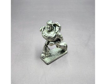 Figura miniatura de Monopoly de Toy Story Buzz Lightyear con ficha de peltre