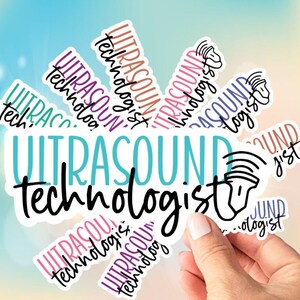 May include: A collection of white stickers with the words "ULTRASOUND technologist" in various colors and fonts. The stickers feature a teal, black, and white design, with a stylized ultrasound image. The stickers are held by a hand.