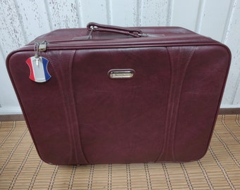 Gorgeous vintage burgundy American Tourister luggage