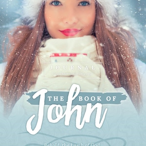 May include: A woman with blue eyes and red lipstick wearing a white fur hat and scarf. The image has text that reads "JOURNAL", "THE BOOK OF John", and a Bible verse from John 1:29.