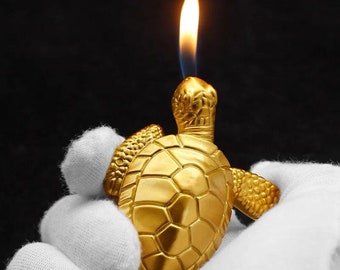 gold tortoise gas cigarette lighter and (many more) fillable gas lighter