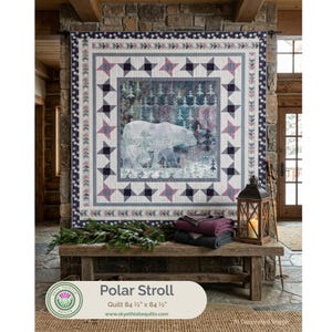 May include: A square quilt titled Polar Stroll measuring 84.5 inches by 84.5 inches. The center panel features a white polar bear in a forest of pine trees. The border consists of geometric star patterns in shades of purple, gray, and white.