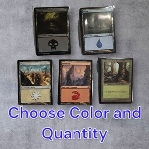 May include: Five Magic: The Gathering cards, each featuring a different land type: Swamp, Island, Plains, Mountain, and Forest. The cards are arranged in a grid pattern on a gray surface. Choose Color and Quantity.